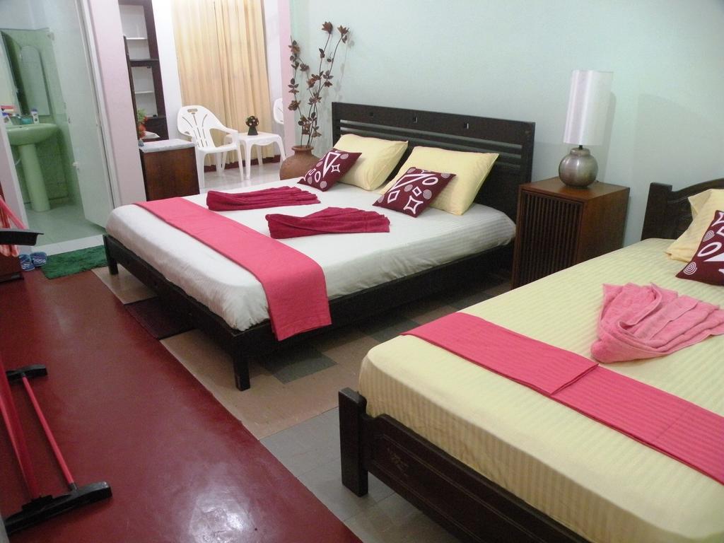 Henderson Airport Residence Negombo Ruang foto