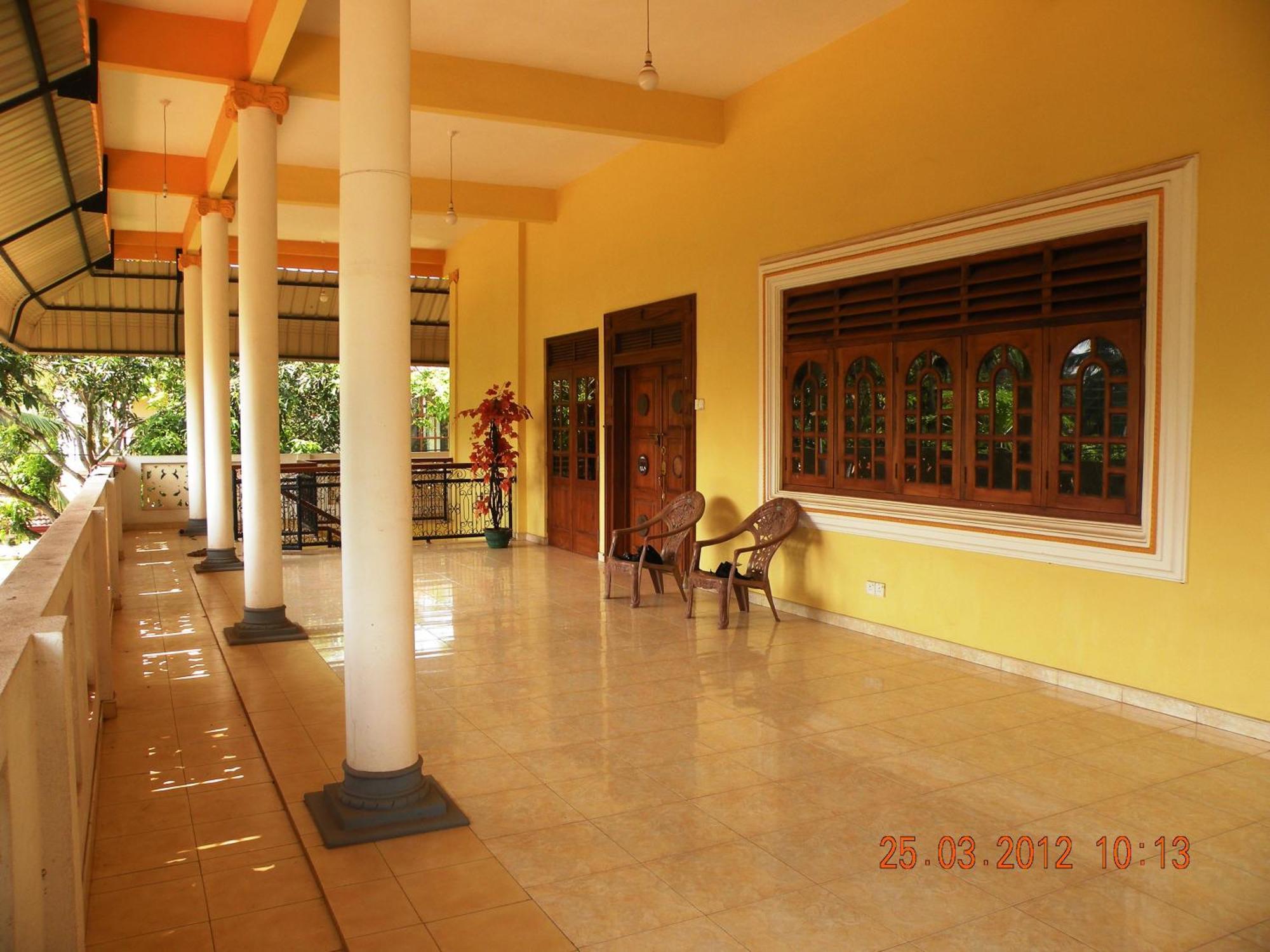 Henderson Airport Residence Negombo Ruang foto