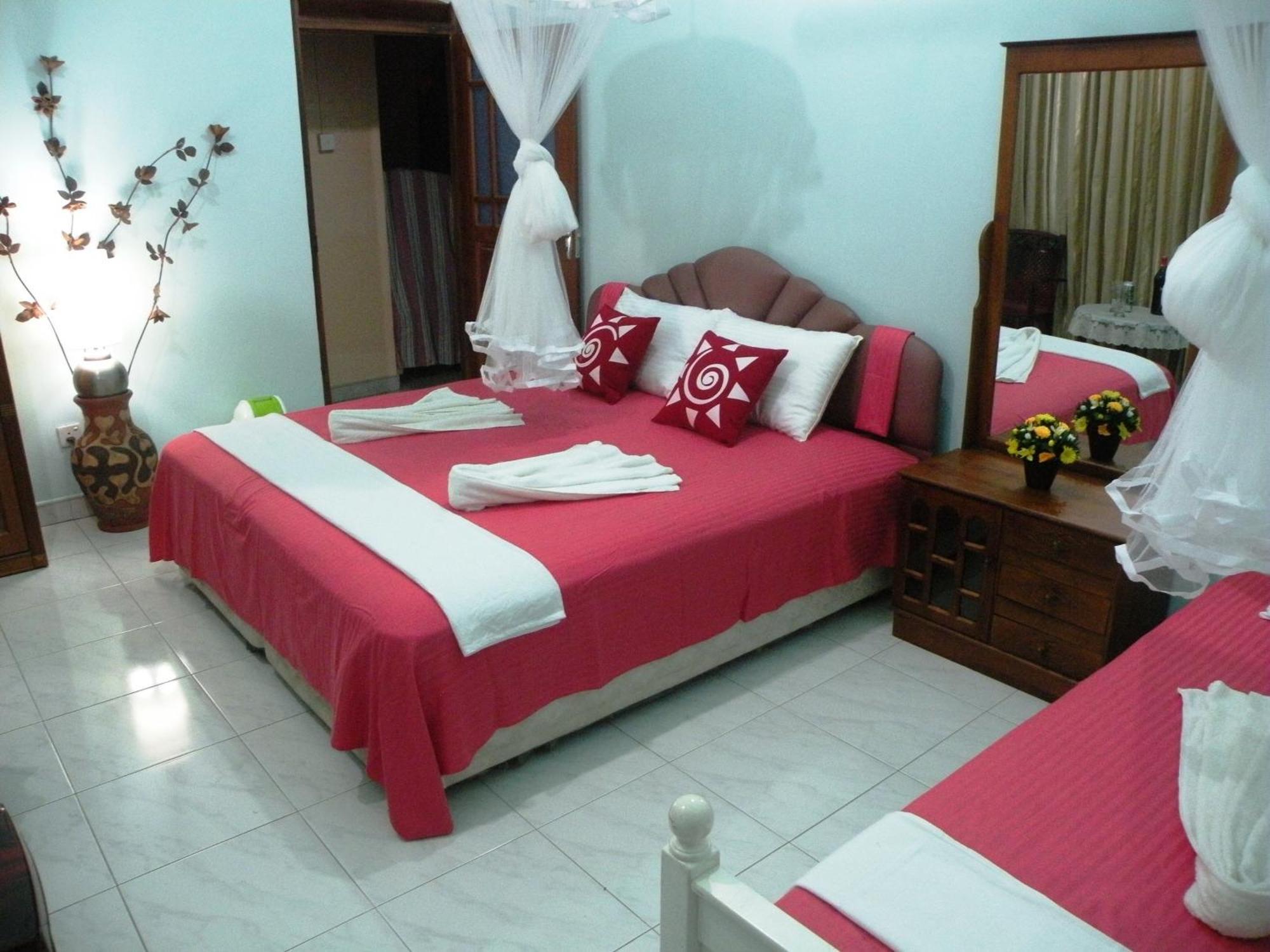 Henderson Airport Residence Negombo Ruang foto