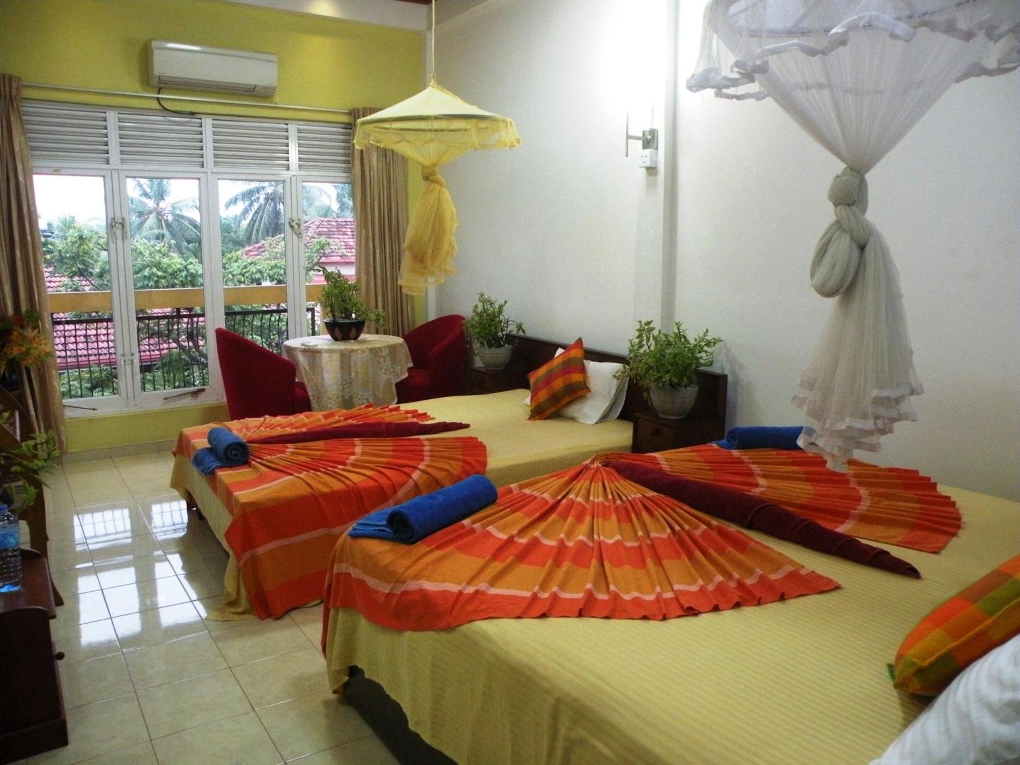 Henderson Airport Residence Negombo Ruang foto