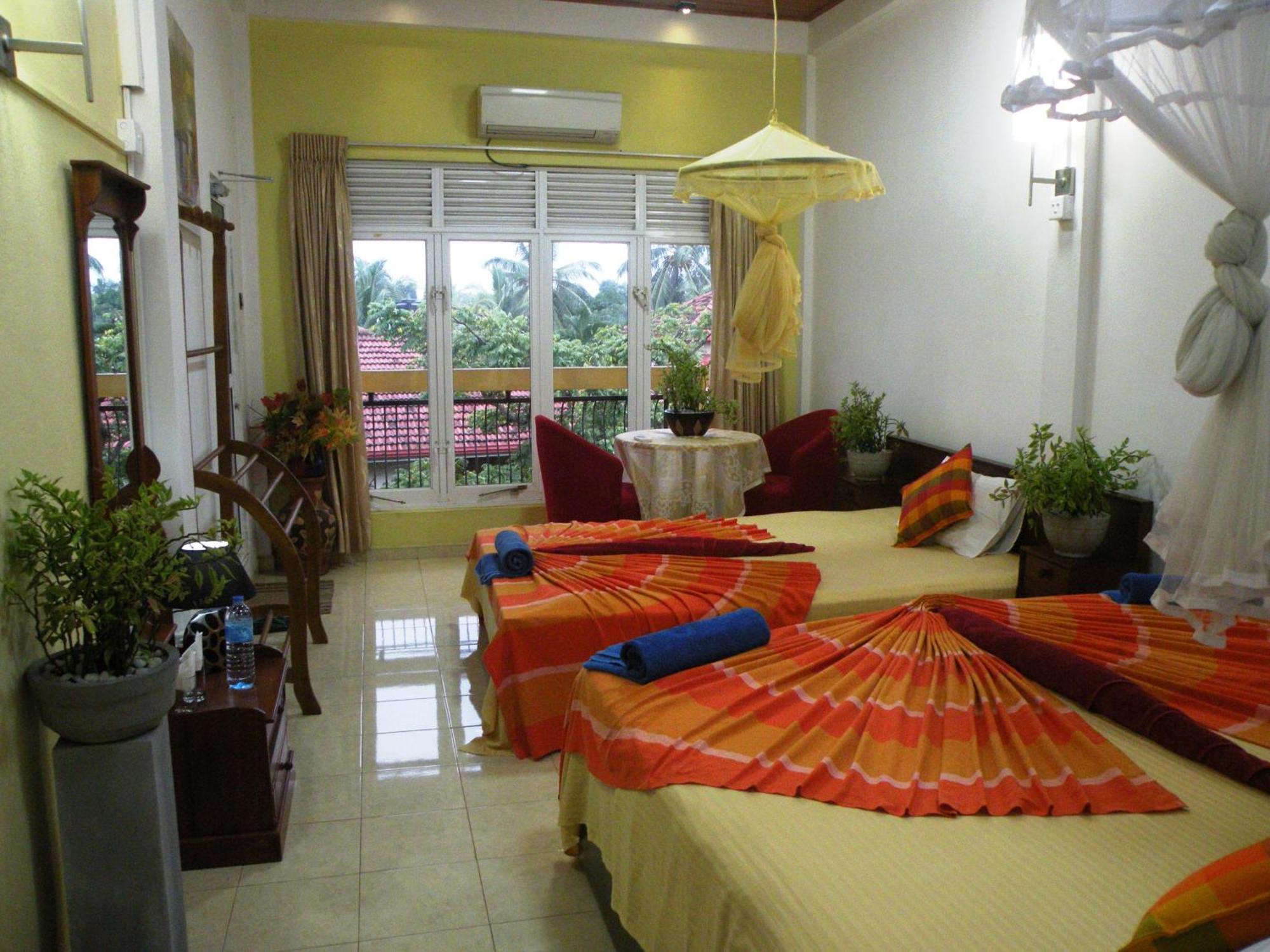 Henderson Airport Residence Negombo Ruang foto