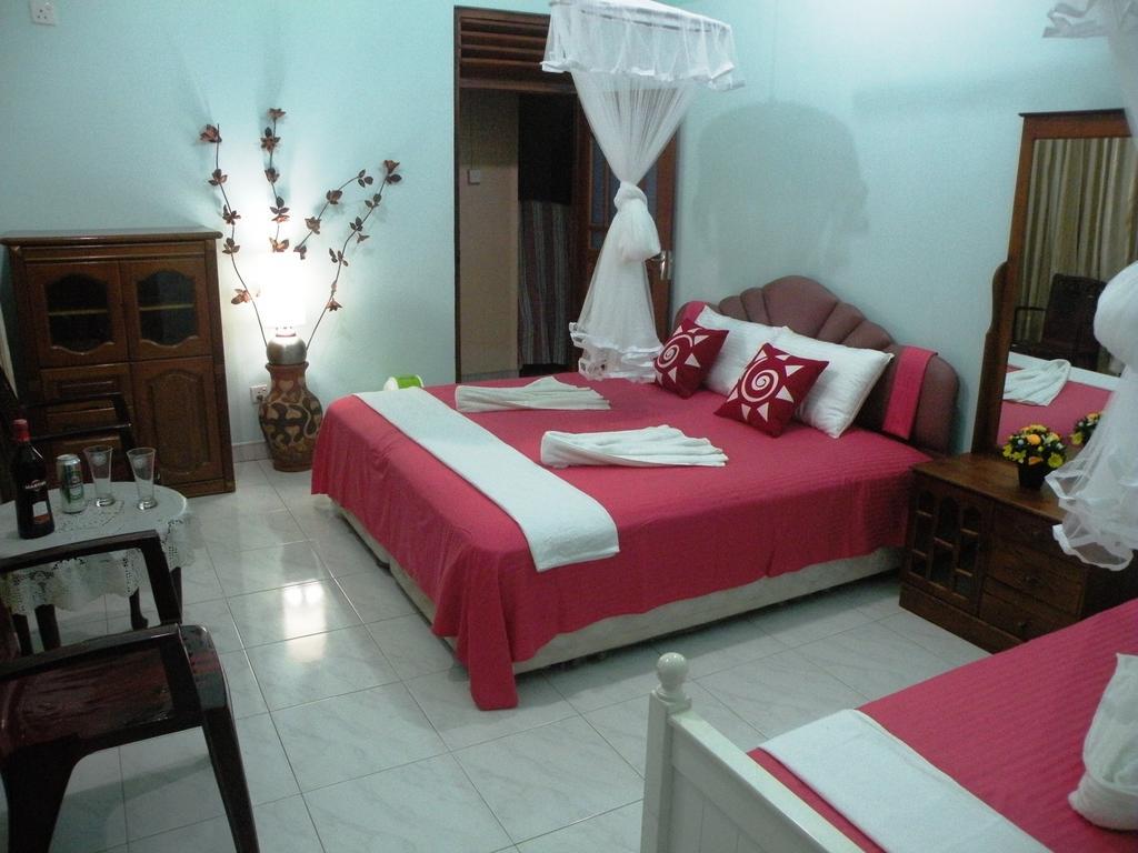 Henderson Airport Residence Negombo Ruang foto